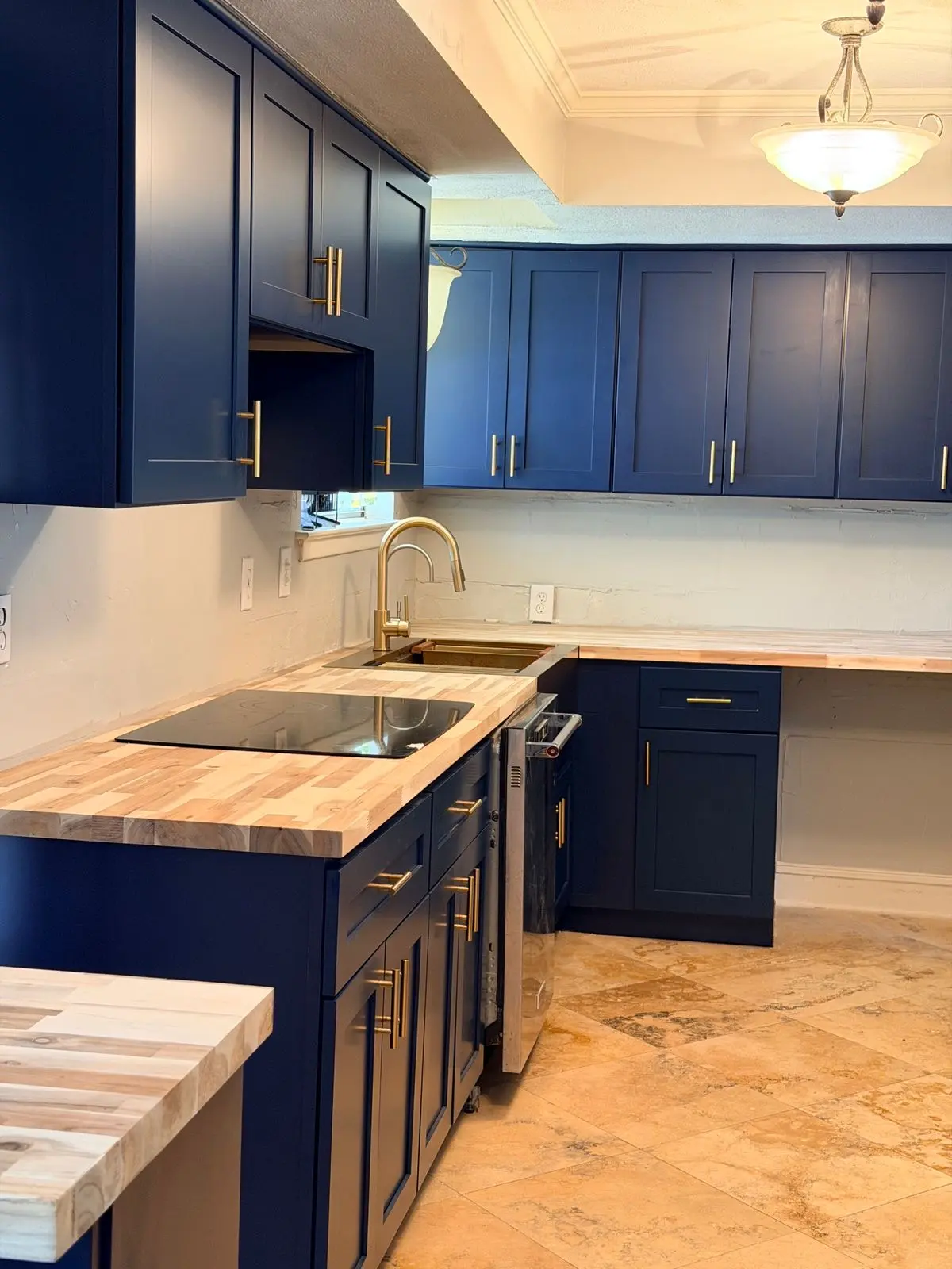 Blue shaker kitchen cabinets installed in Irving TX home